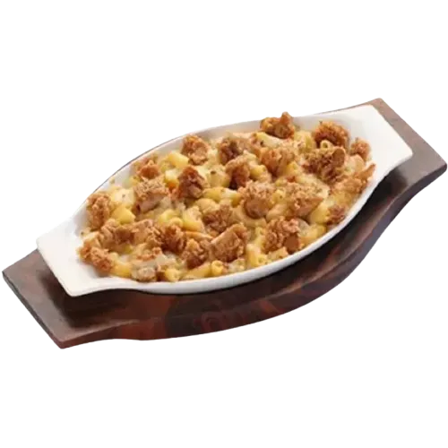 Cheezious Crunchy Chicken Pasta served in a sizzling dish